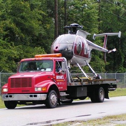 Bryant's towing a helicoper off of the interstate